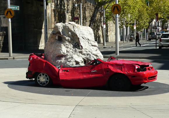 Ford Festiva Crushed Art Car - Still life with stone and car