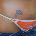 Art Tattoo feminina virilha Golfinho
