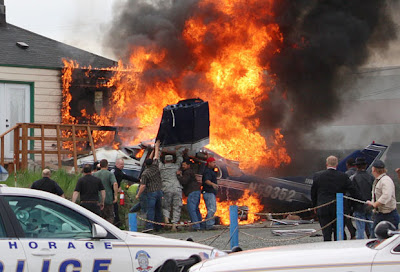 Cessna 180 on fire as locals desperately attempt to save the passengers on board