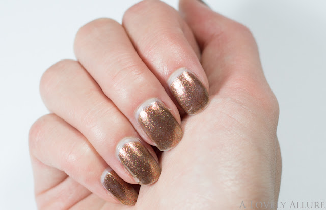 covergirl catching fire capitol collection hunger games glosstinis seared bronze review