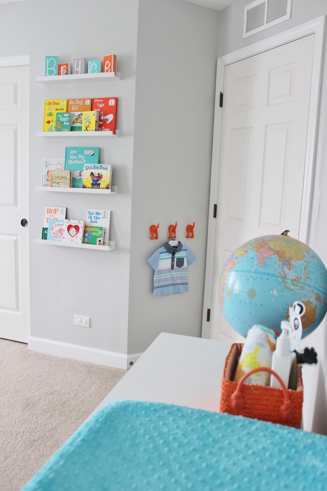Aqua, Orange, and Grey Nursery with Stripe Wall and Lots of DIY Projects #nursery #diy