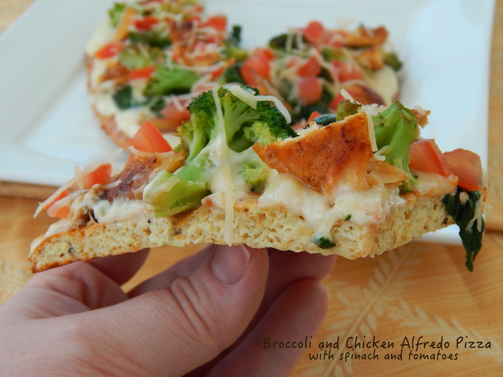 Broccoli and Chicken Alfredo Pizza with Spinach and Tomatoes Cut The
