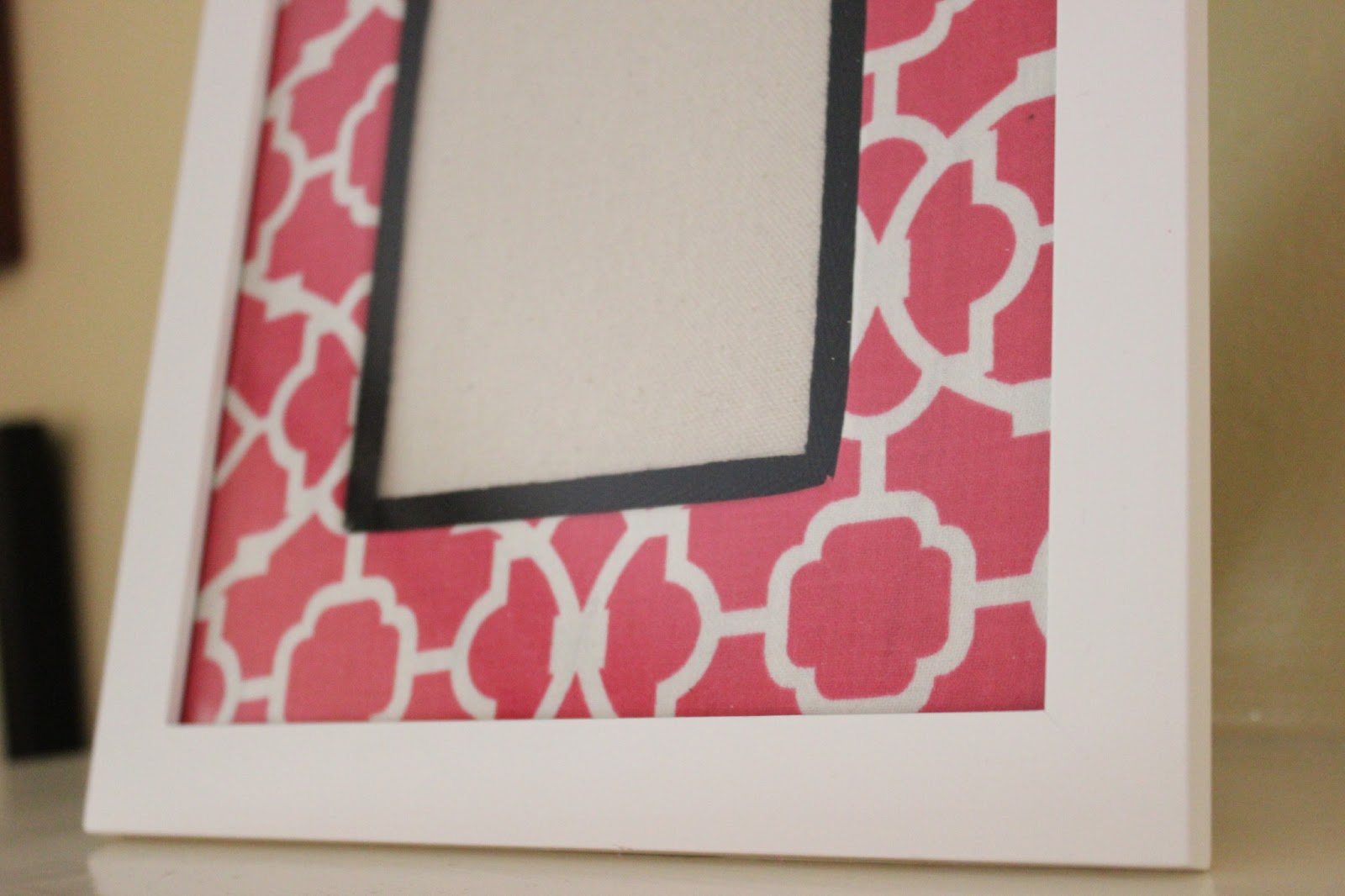 Cathie Filian DIY How to cover a photo mat with fabric and Mod Podge.
