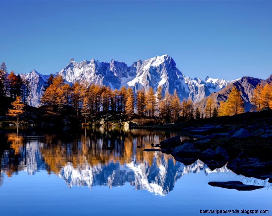 Cielo montañas de piedra nieve lago reflexión de agua árboles Cielo montañas de piedra nieve lago reflexión de agua árboles