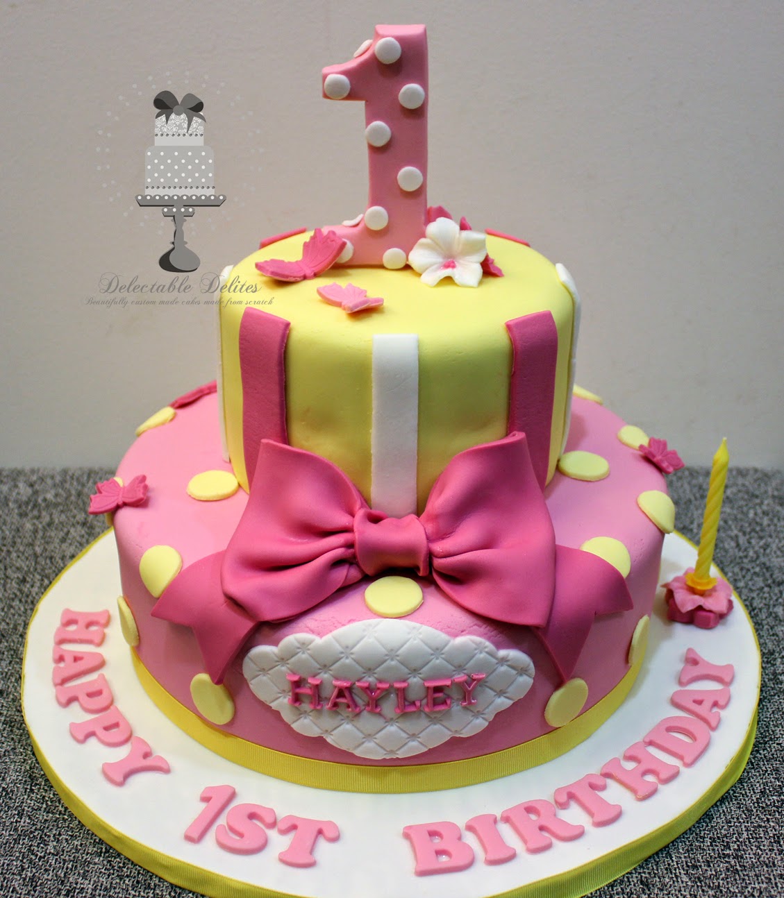 Delectable Delites Pink & yellow theme cake for Hayley's 1st birthday