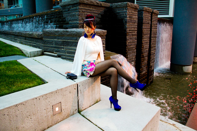HandM electric blue feather earrings, wholesale7 white angel top, sugarlips different strokes shorts, colourful shorts, sugarlips shorts, opaque tights, cross necklace, tobi clutch inspired by alexander mcqueen, electric blue heels, hot heels, pearl necklace head piece, fashion, style, street style, vancouver street style blog, fashion blog, unique style, unique fashion, amazing style, amazing fashion
