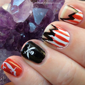 Freestyle pirate-themed nail art for the Avast Ye Bilge Rats pirate nail art challenge, day 5.