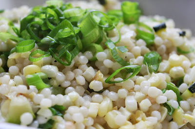 Lemony Israeli couscous with corn, scallions, and zucchini