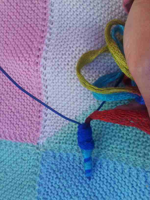 A Vintage Crafty Adventure Yarn wrapped coat hanger hearts