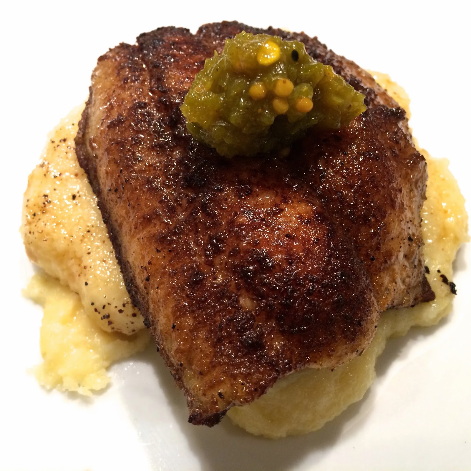 Blackened Catfish over Smoked Gouda Grits topped with Pickled Jalapeño Relish