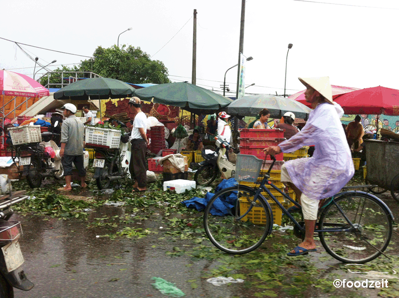 dirty street market streets wet rainy hanoi road