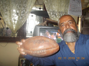 Holding a authentic original "SPRINGBOK" rugby  ball purchased from Durban in South Africa .