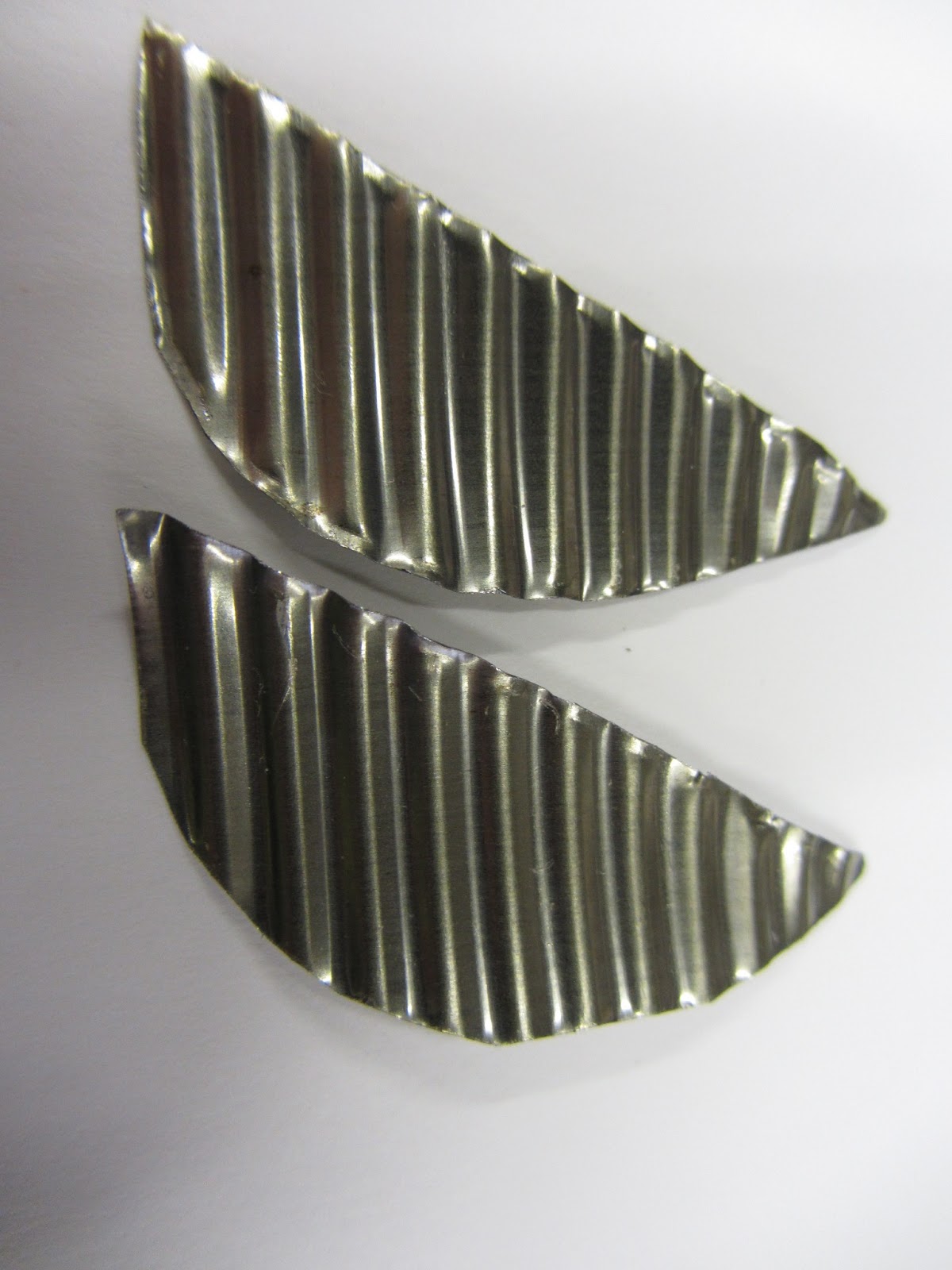 Mabel Lowman Art Metalwork Recycling a cat food can