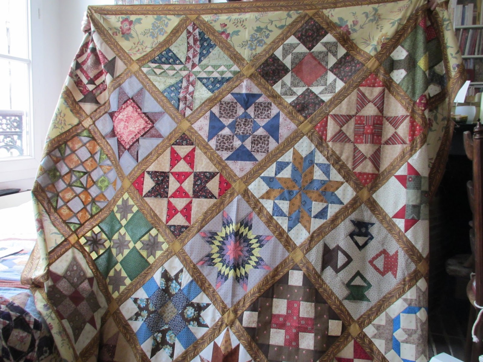dutch quilt cat COVERED WITH QUILTS
