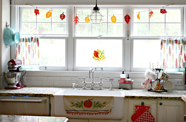 Kitchen towels as curtains in white kitchen with farmhouse sink-www.goldenboysandme.com