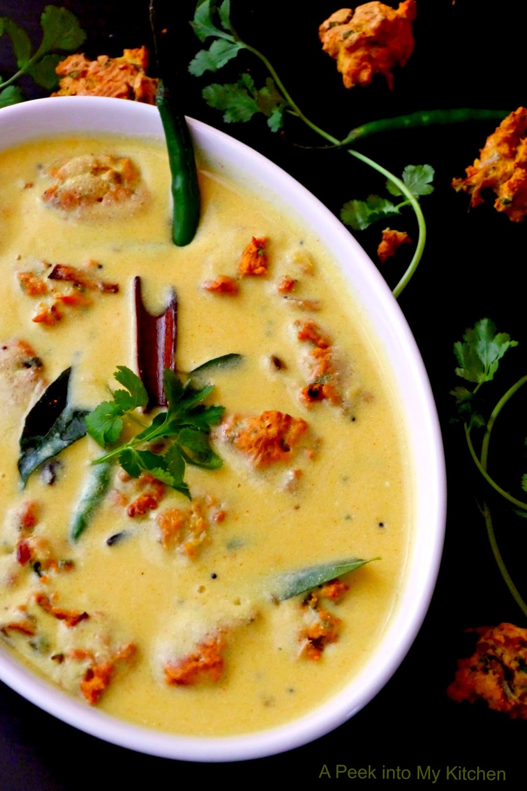 A Peek into My Kitchen Kadhi Pakora (Baked Version) Spiced Yogurt