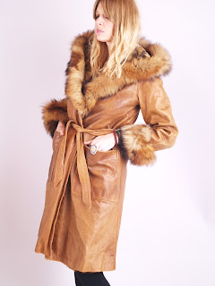 Vintage 1970's brown coyote fur and leather trench coat with hood.