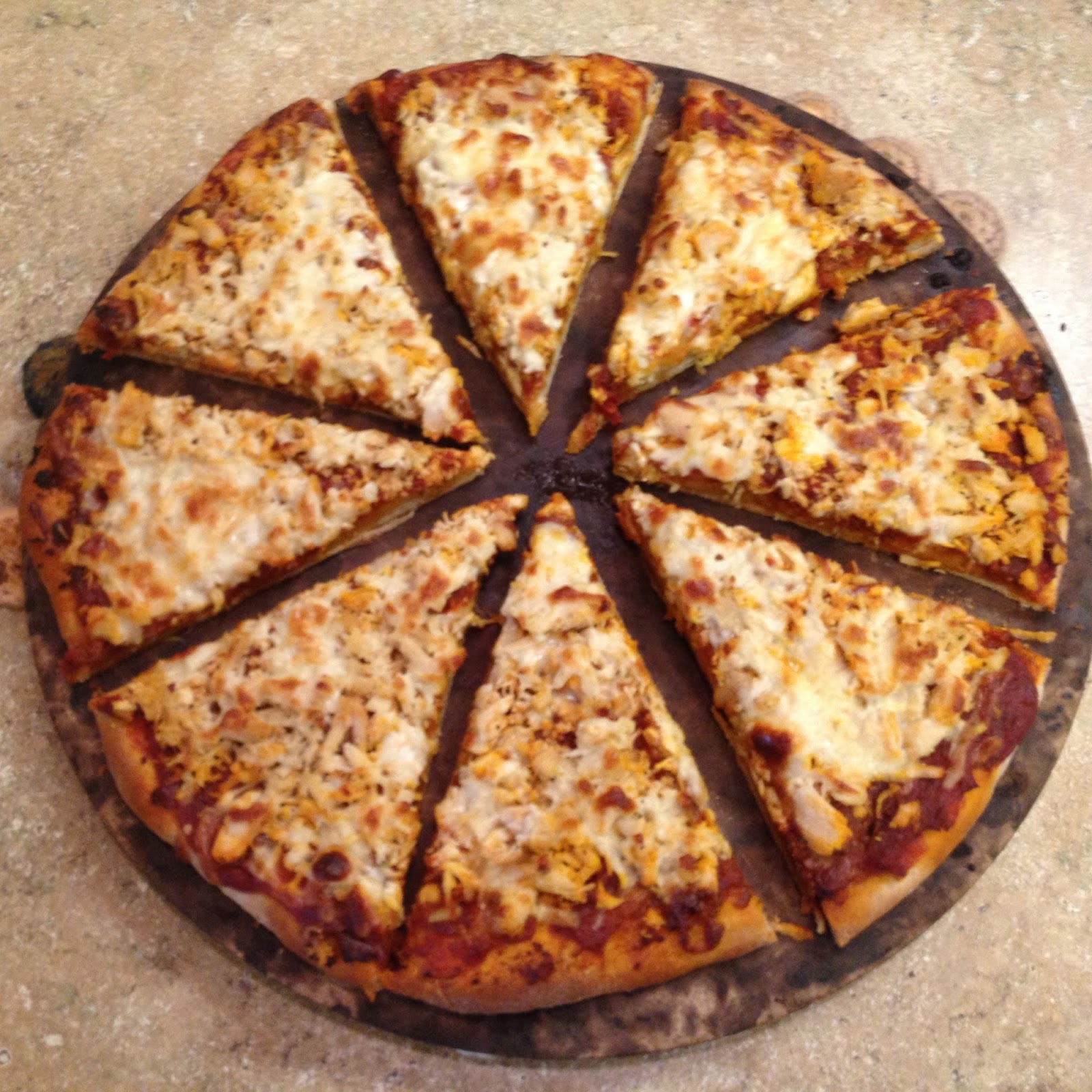 Cardio Pizza Roasted Garlic, Sundried Tomato Pesto, & Chicken Pizza