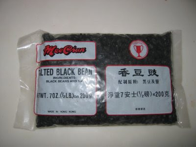 They are dried, fermented black beans. They are salted and shriveled and