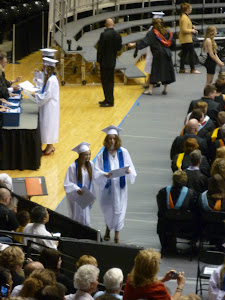 Keegan and Kelsey walking together after they received their diplomas.