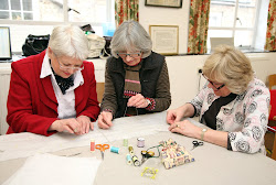 broderers at work . . .