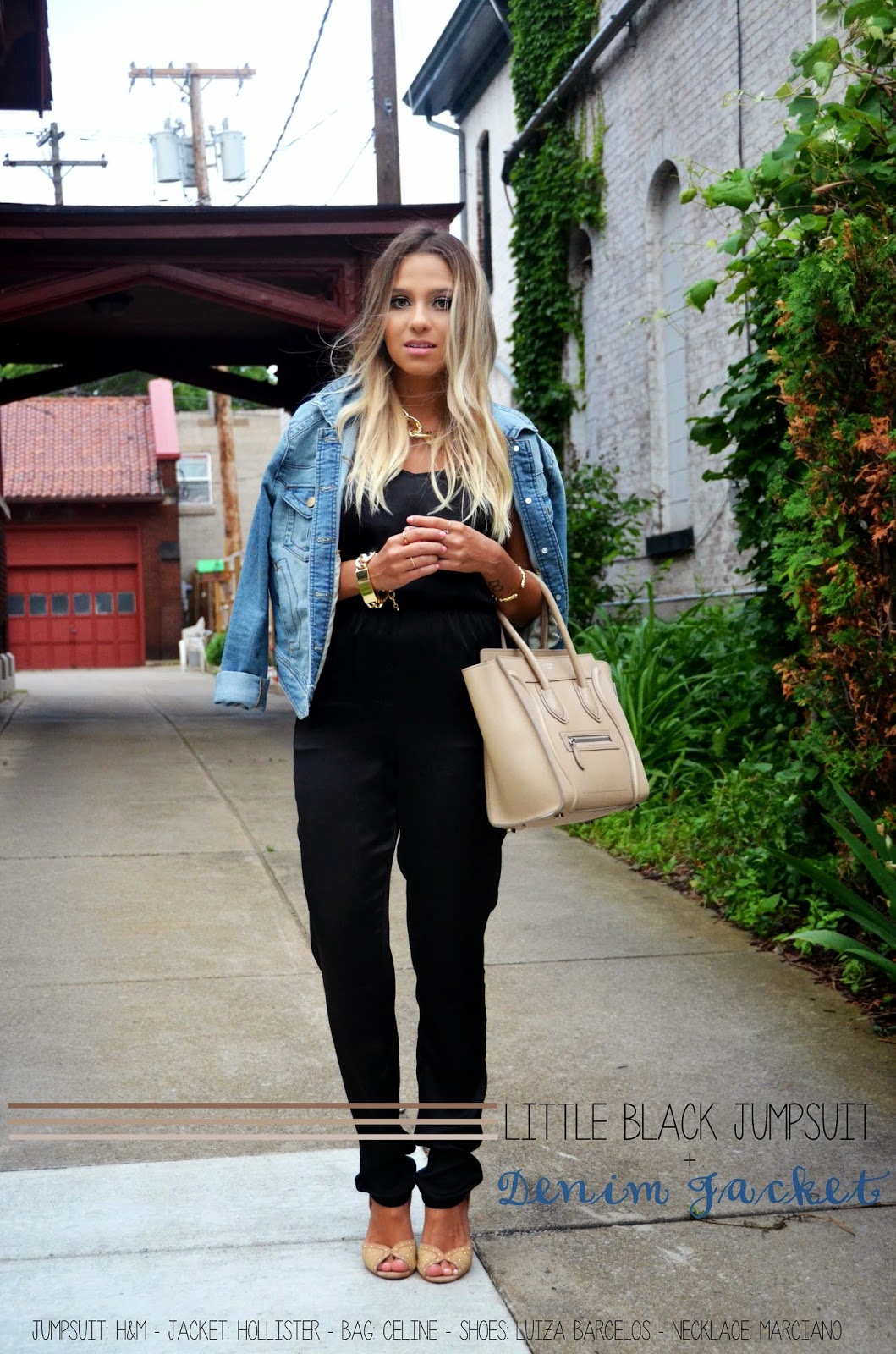 black jumpsuit with denim jacket