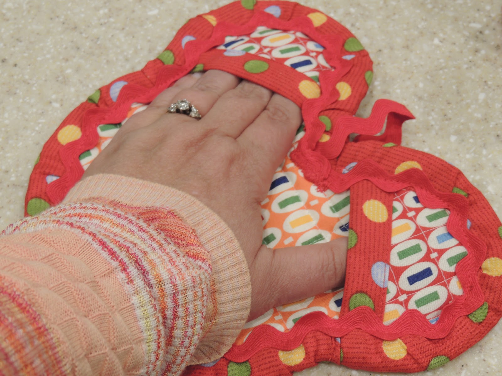 Seriously..I think it needs stitches. Mickey Mouse Hot Pad