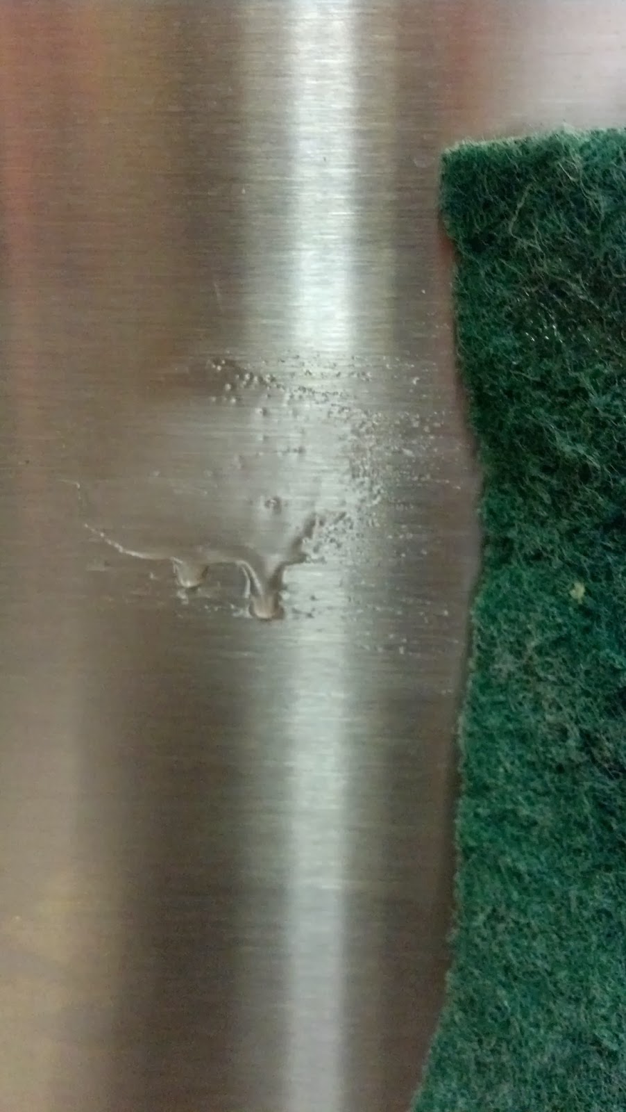 How to Repair a Deep Scratch on a Brushed Stainless Steel Frigidaire, Hunker