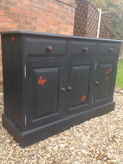 Black Sideboard with Butterflys