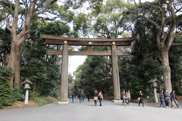 The main entrance of huge torrii gate of Meiji Shrine as you walk out from JR Yamanote Line at Harajuku Station, Tokyo, Japan The main entrance of huge torrii gate of Meiji Shrine as you walk out from JR Yamanote Line at Harajuku Station, Tokyo, Japan
