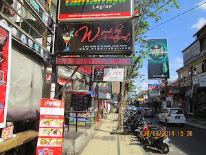 "LEGIAN STREET", a "One Way" street for partying and shopping.