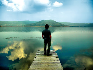 Photo titled "A man and his thoughts".  It is a great picture for this article, as the purpose of a "life architecture" is to get clarity into one's life.  If our lives are as clear as what the man in the picture sees in front of him, we can live a more focused and effective life.