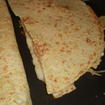 Enchiladas aux oeufs brouillés, jambon et fromage