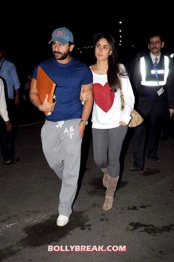 Saif Ali Khan, Kareena Kapoor Saif Ali Khan, Kareena Kapoor - Saif Ali Khan & Kareena snapped at the airport - August 2012