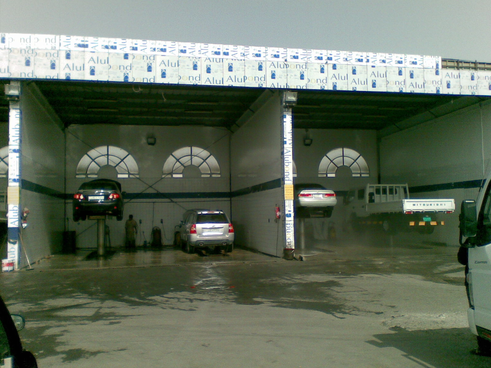 To Do in Doha Car cleaning on jacks on the Salwa Road