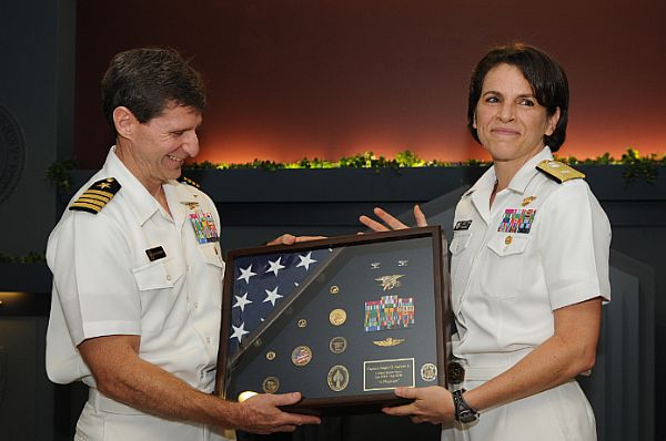 RDML Herbert surprises her Navy SEAL husband, Roger, with a retirement ...