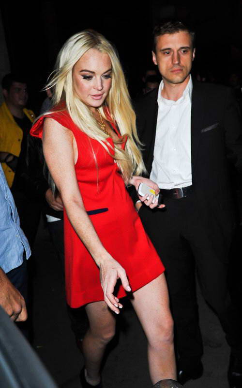 Lindsay Lohan Brightens Up the Night in Vibrant Red 4