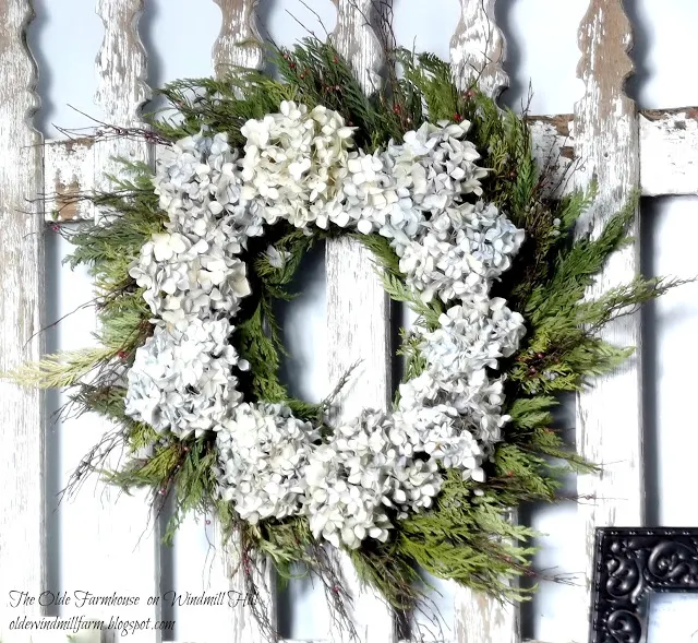 Evergreen and hydrangea wreath - By The Olde Farmhouse on Windmill Hill featured on I Love That Junk