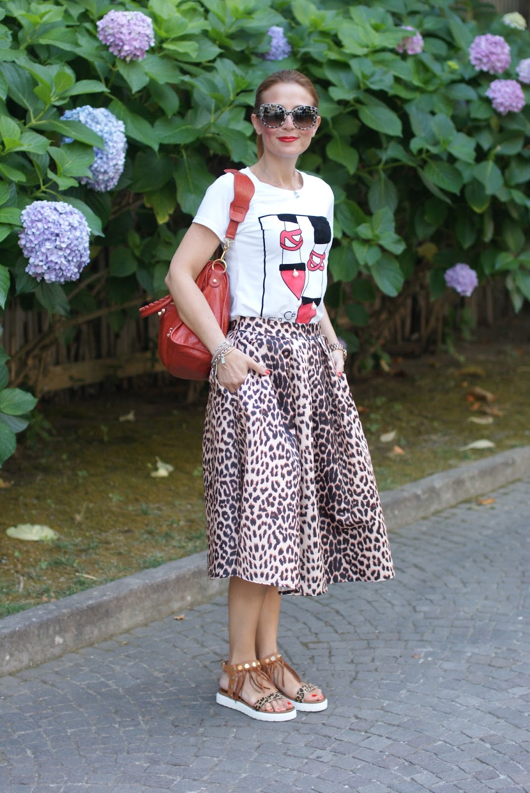Leopard print is the new neutral with Dolce & Gabbana leopard sunglasses found on Giarre.com, leopard print midi skirt on Fashion and Cookies fashion blog, fashion blogger style