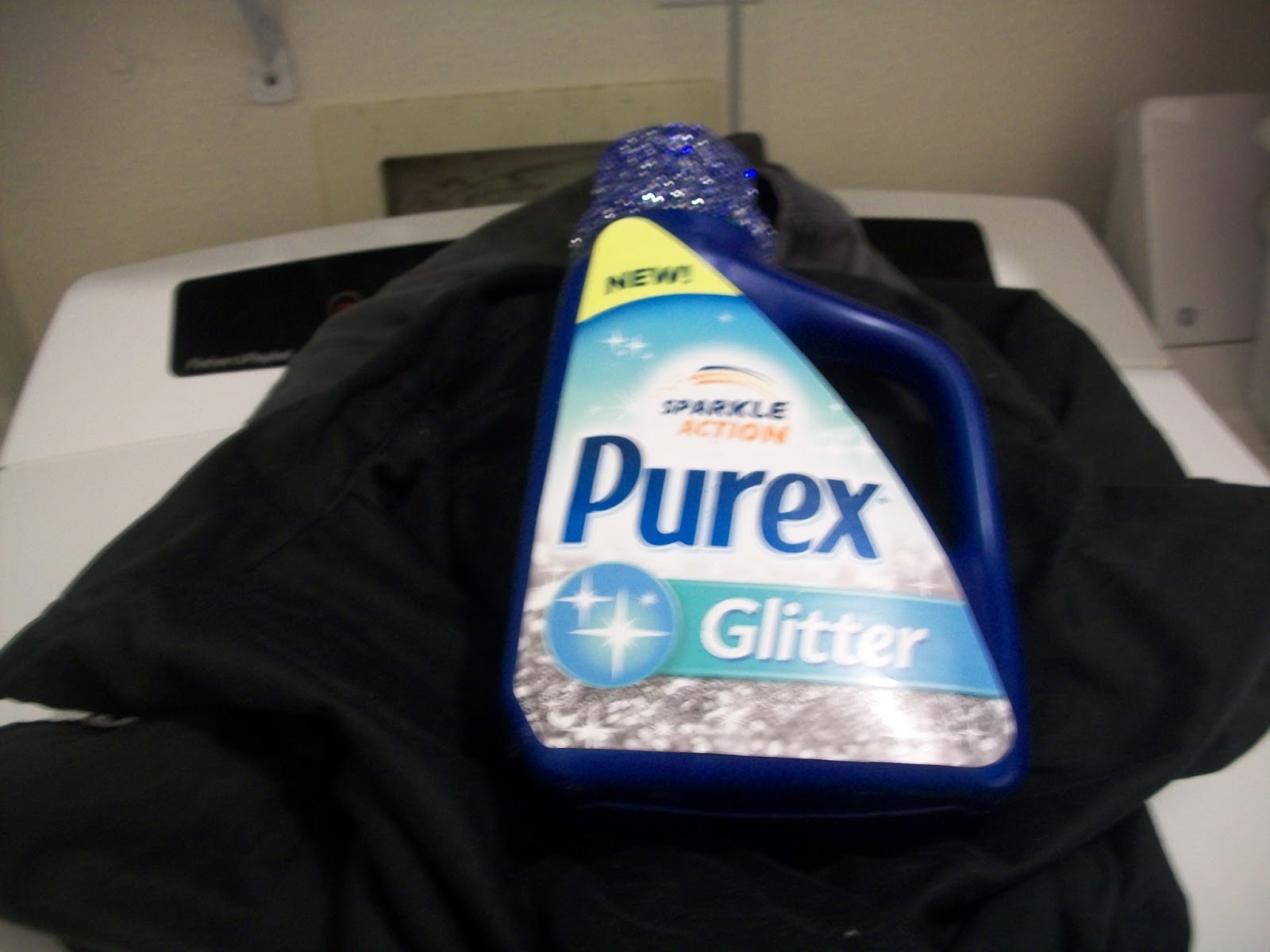 I used New Purex Glitter to wash her graduation gown and it came out