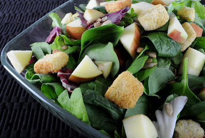 Mixed Greens with Apples, Sunflower Seeds, and Croutons with a White Cheddar and Chive Vinaigrette