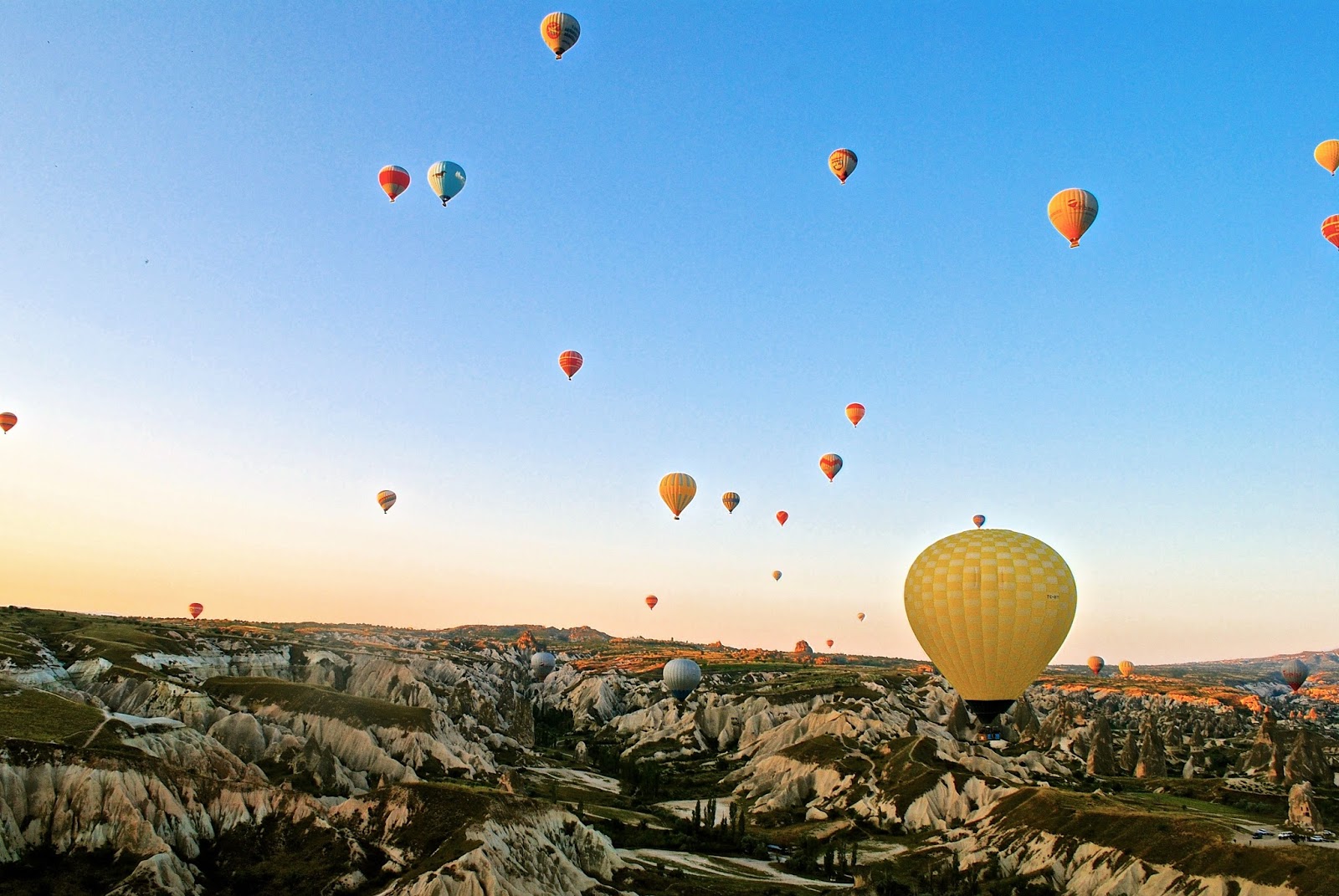 Hot Air Ballooning over Goreme Cappadocia at Sunrise with Butterfly Balloons