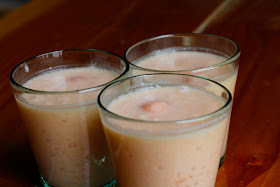 tapioca pearls with cantaloupe and coconut milk served in cups