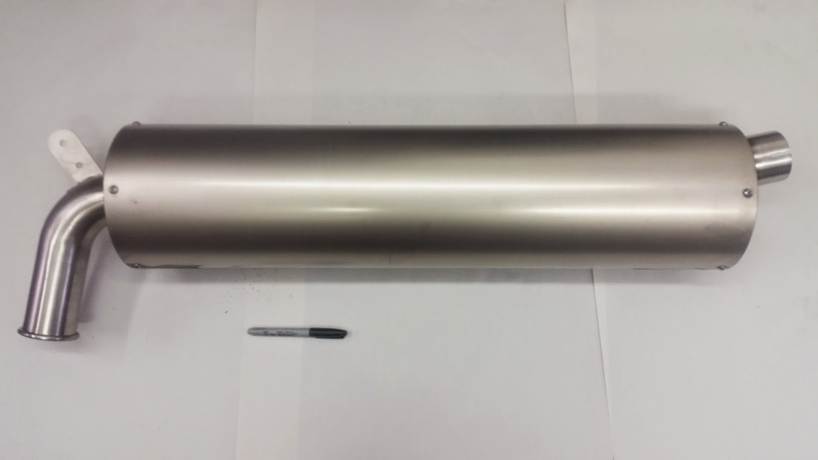 Raceco Exhaust prior to polishing with sharpie pen as a reference to the size!