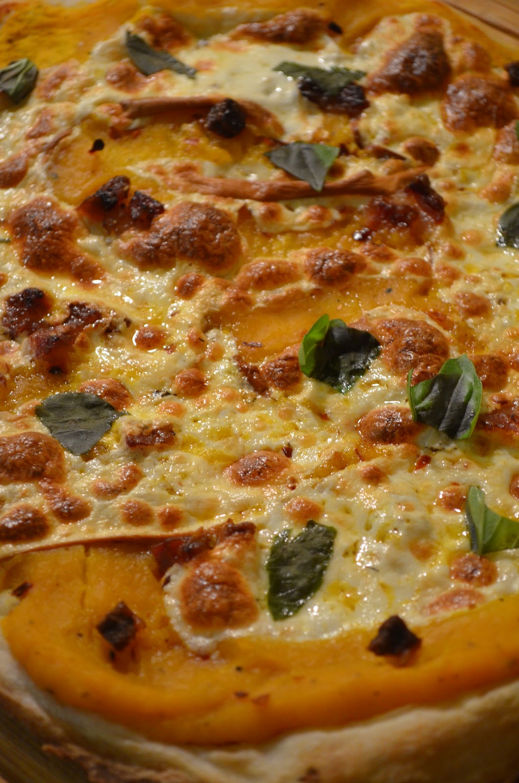 amour fou(d) butternut squash pizza with smoked mozzarella and pancetta.