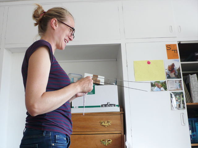 Having a laugh dowsing for objects using metal coat hangers.