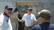 Cite Soleil,: DWC Board Members and Team Leader, Richard Screpel and Dan Miller at the project site
