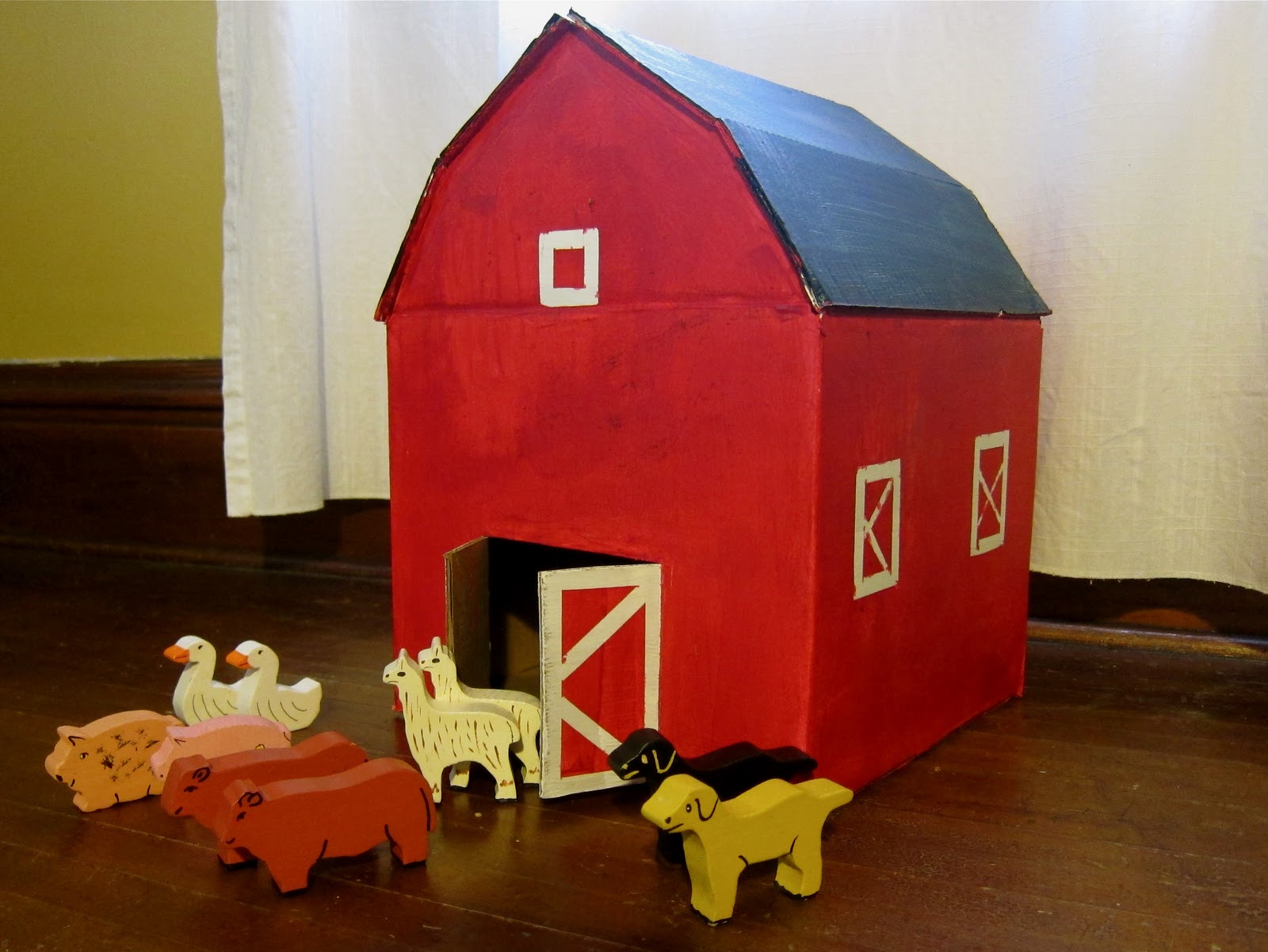 A Little Red Cardboard Barn