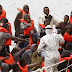 Rescued migrants on the deck of an Armed Forces of Malta patrol boat