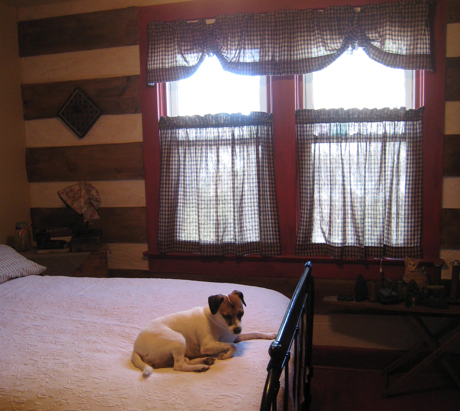 The Vintage Seamstress Faux Log Walls in the guest room...